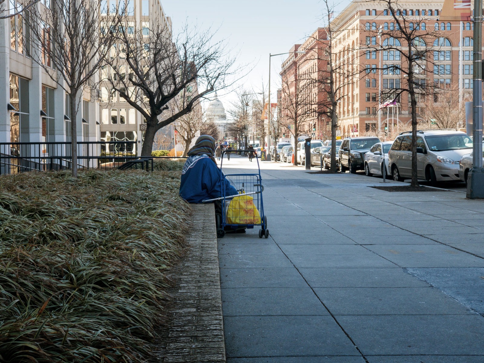 Man sitting on a public street