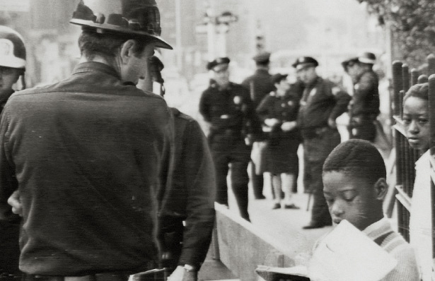 Old photo of cops arresting man