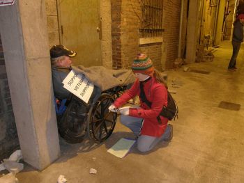 Interviewing homeless veteran in a wheelchair