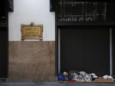 Homeless Man sleeping outside Macy's