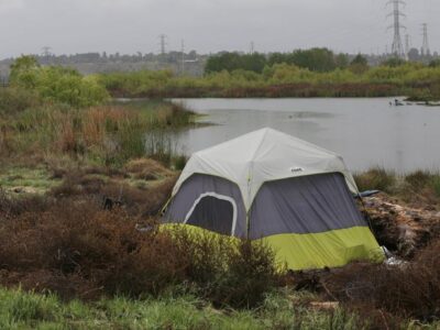 In this file photo from April 2020, a homeless shelter sits at the Weir Water Control basin. Alex Horvath, The Bakersfield-Californian