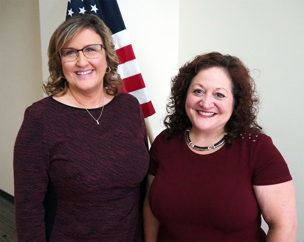 Mary Simons, Executive Director/CEO of Open Doors Homeless Coalition, and Jodie Picciano Swanson, homeless program manager for the Gulf Coast Veterans Healthcare System