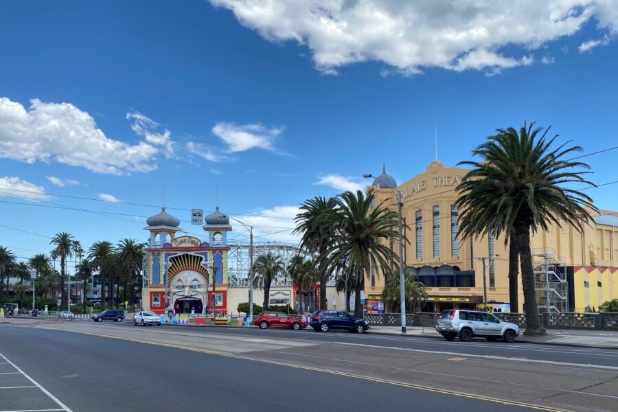 Photo of street in Port Phillip with buildings and palm trees