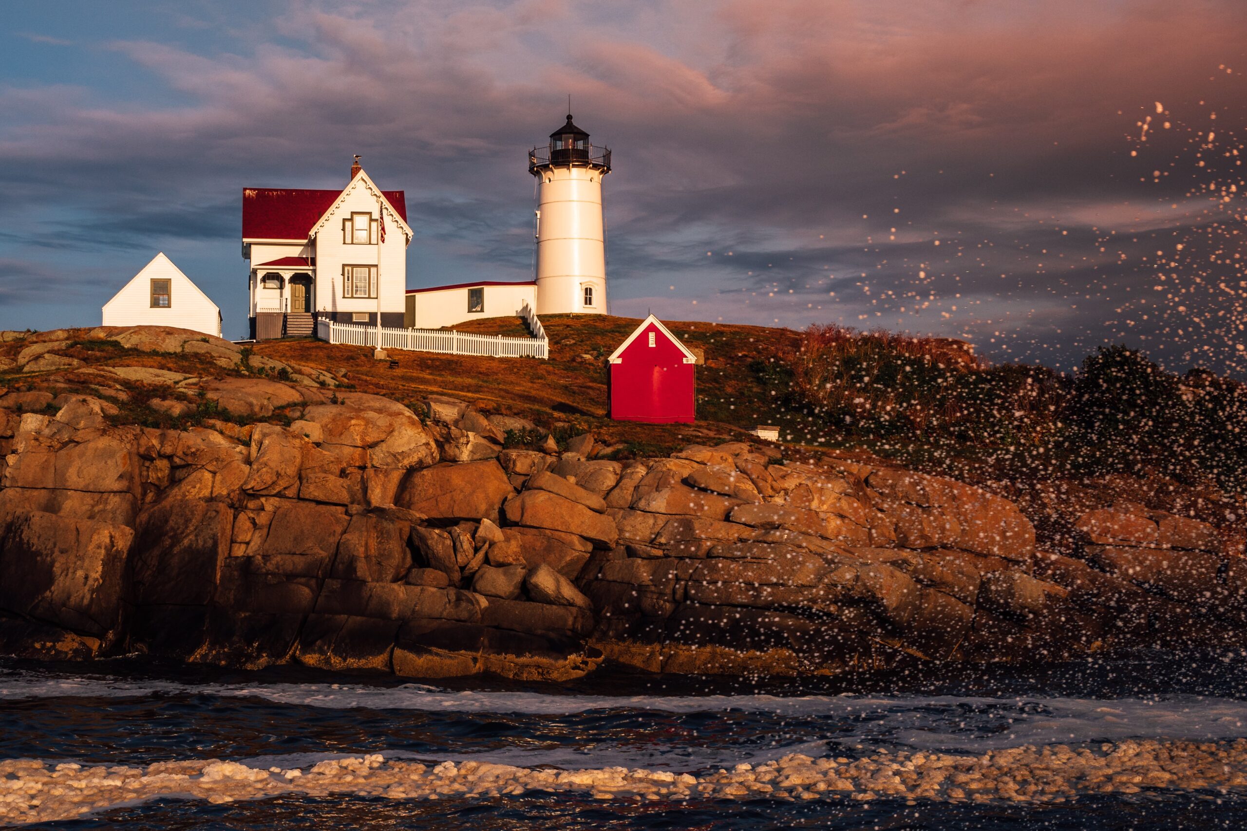 Lighthouse on cliff in Maine
